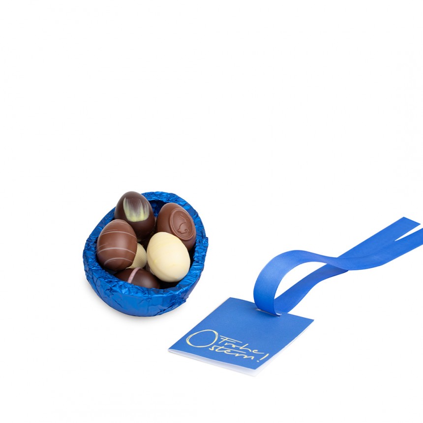 Präsent-Ei Schokolade, gefüllt mit Pralinen-Eiern, 140 g